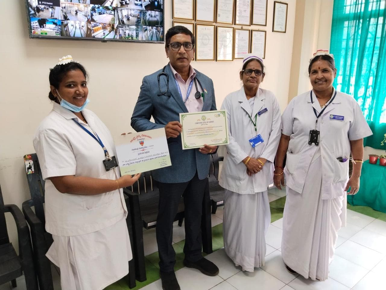 Staff recognition presentation, shown in the GHCCD gallery