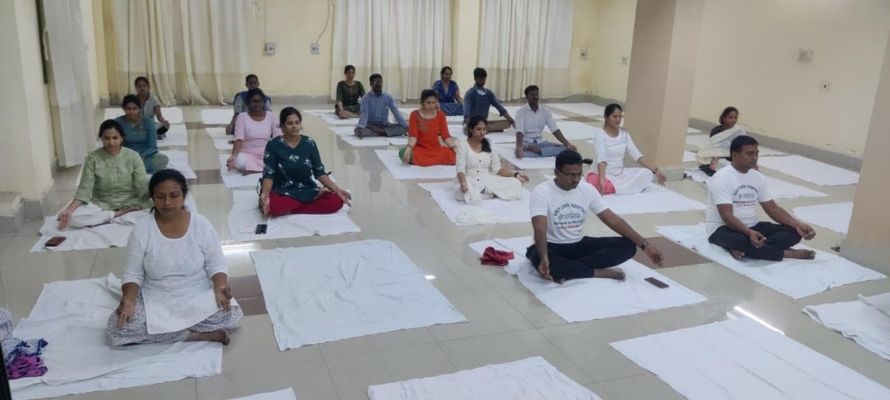 Group wellness and yoga activity, shown in the GHCCD gallery
